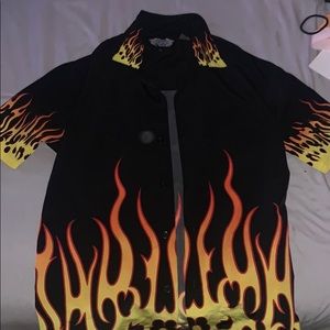Black polo shirt button down with fire at the ends